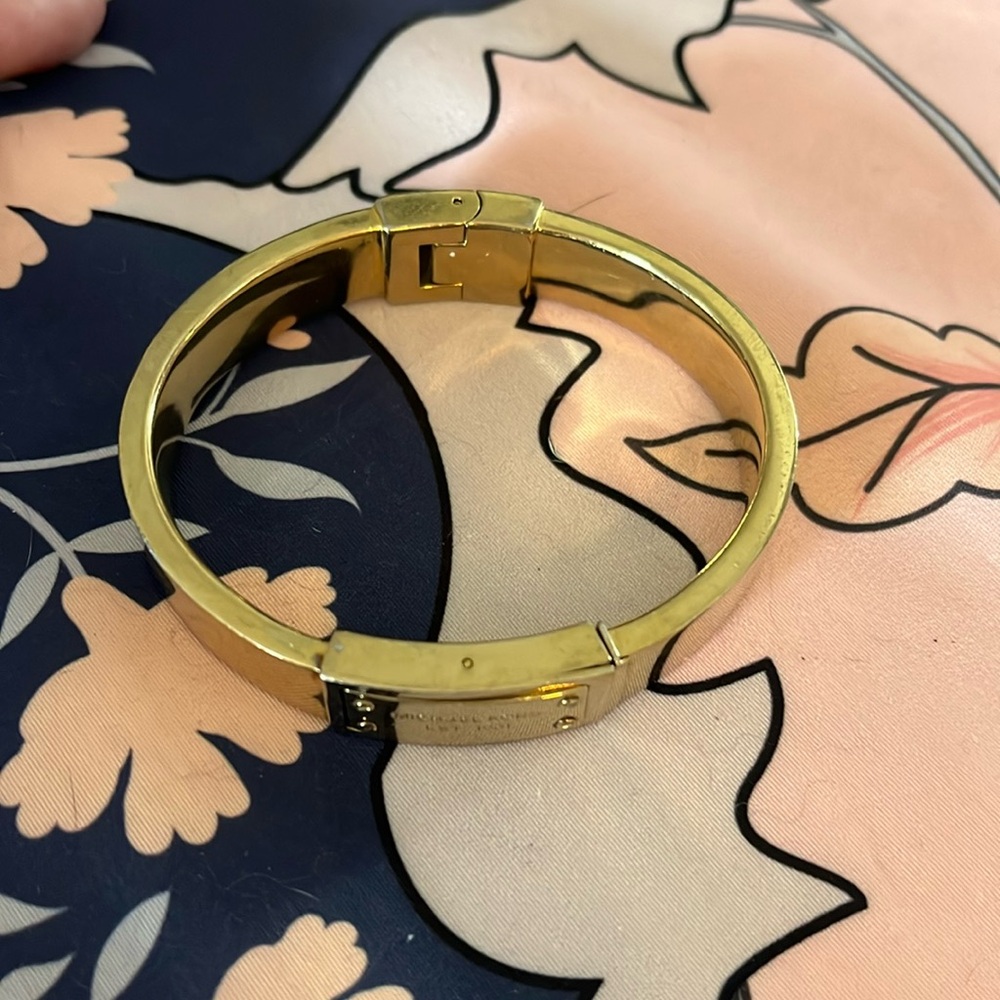 Michael Kors Gold bangle bracelet.